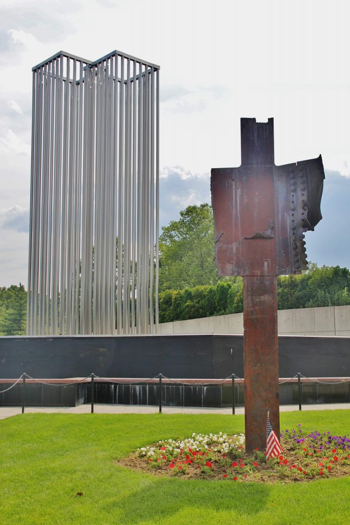Semi-transparent aluminum towers and recovered World Trade Center steel.